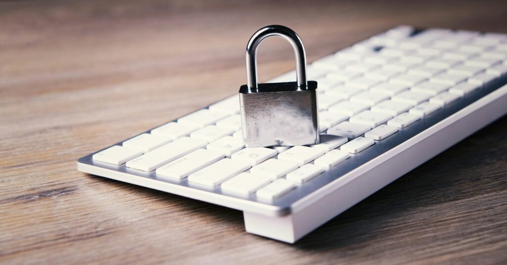 Remote Work Security Revisited: Advanced Strategies for Protecting Your Business in 2025 5 a computer keyboard with a padlock on top of it
